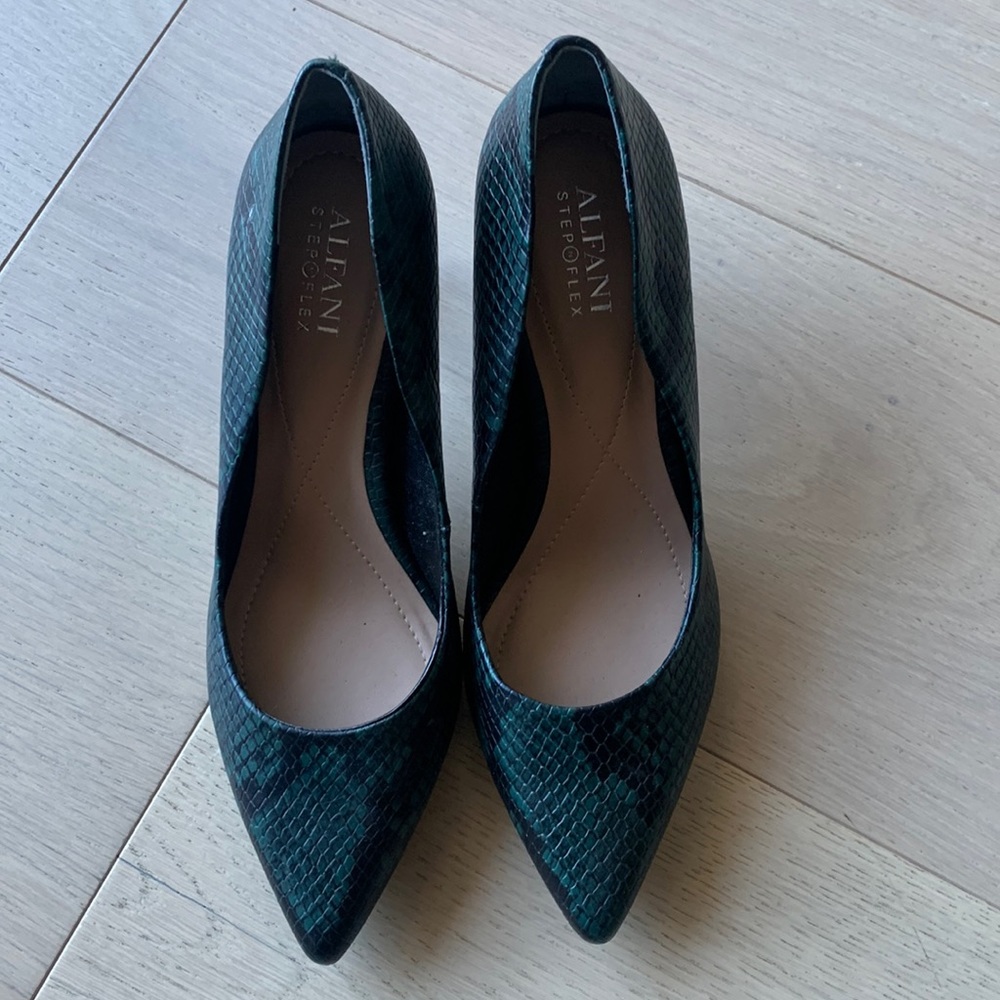 Green croc effect pointy heels.